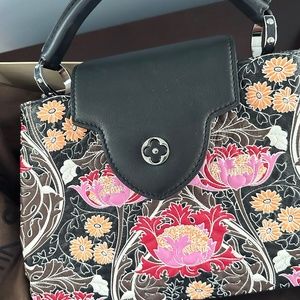 Louis Vuitton runway handbag. Never used!